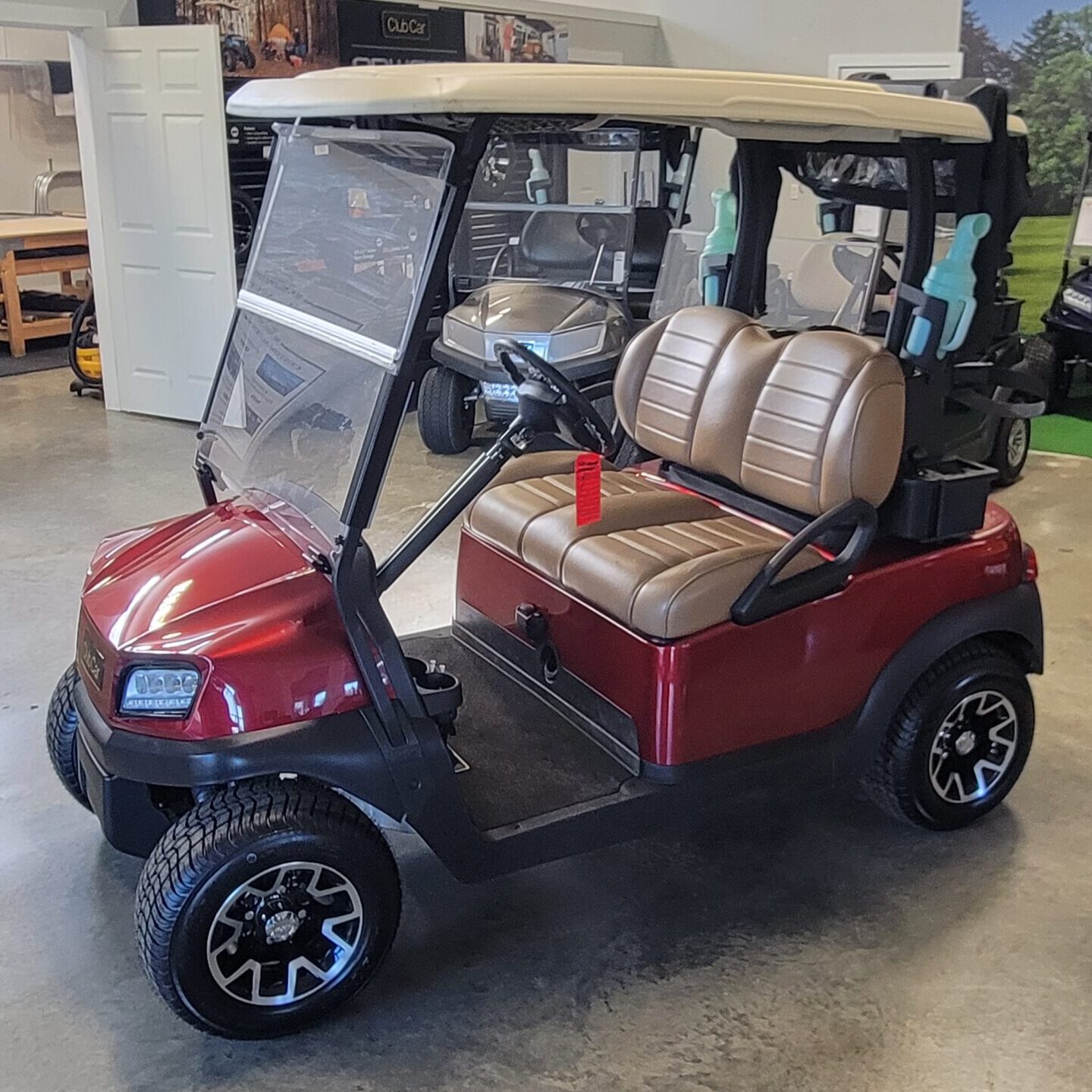 2023 Club Car Tempo Electric, Metallic Red Isle Golf Cars Inc.